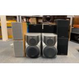 A pair of Sony speakers SS-E20 with a pair of Sony speakers SS-CCP33 with a further pair of