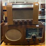 A wooden cased McMichael radio model 481AC together with a Marconi T19A broadcast receiver.