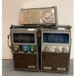 Three vintage portable radios.