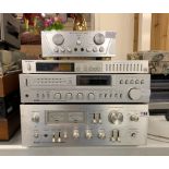 An Akai stereo amplifier AM-2800 with an Akai stereo receiver model AA-R31L also with a Technics
