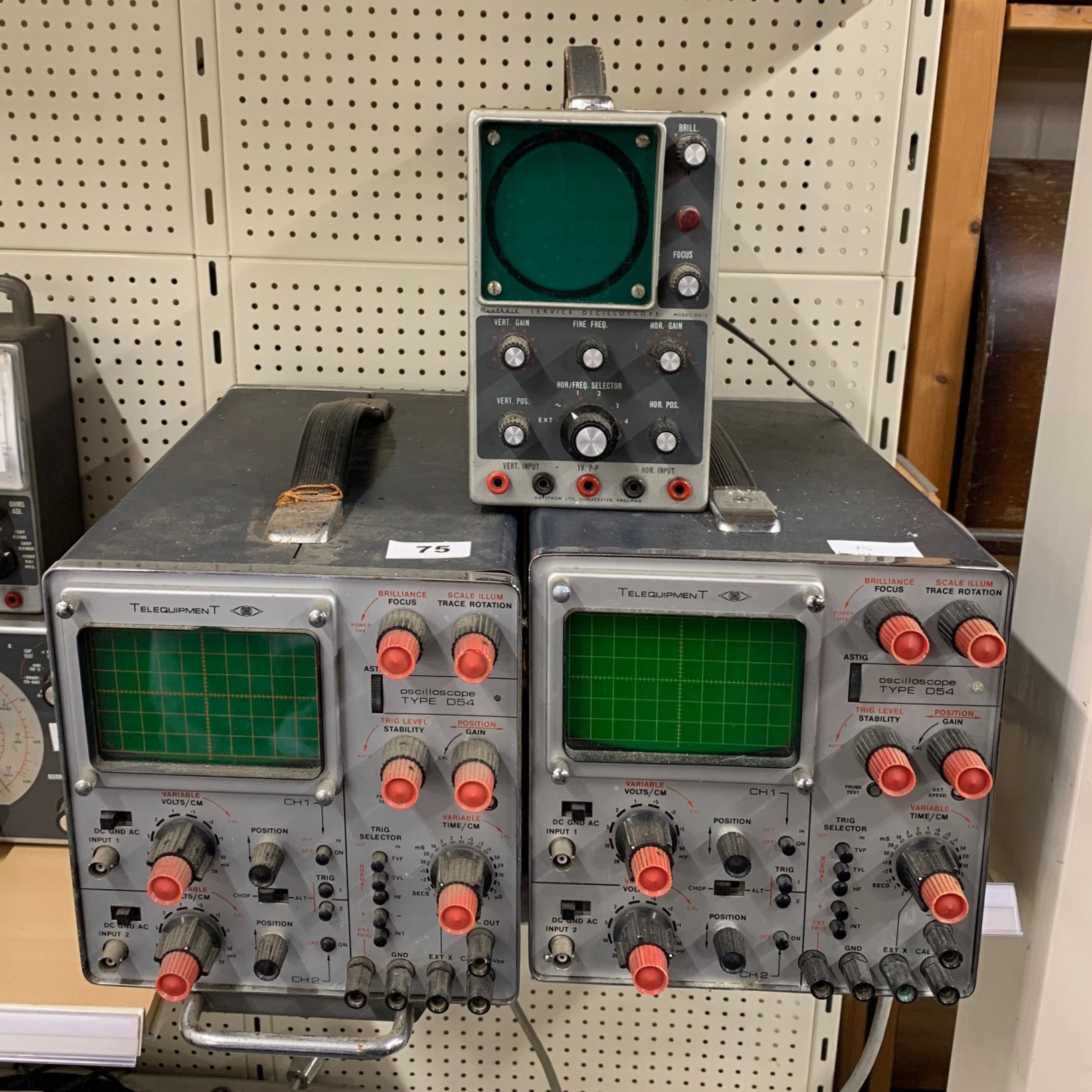 Two vintage oscilloscopes together with a Heath kit service oscilloscope model OS-2.