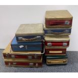 Nine vintage cased portable radios.