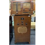 A large free standing Murphy radio type A30C together with a Portadyne wooden cased radio.