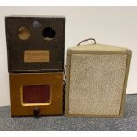 Three vintage wooden cased speakers.