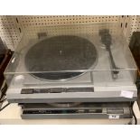 A Hitachi direct drive turntable model HT50S together with a trio automatic return turntable model