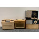 Nine vintage portable radios.