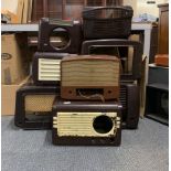 A collection of Bakelite empty radio cases.