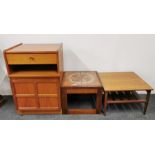 Two 1970's teak coffee tables with a Nathan teak cabinet.