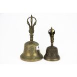 Two Tibetan brass / bronze temple bells, tallest. 21cm.