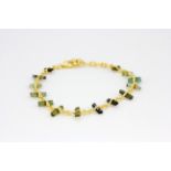 A 925 silver gilt bracelet set with rough tourmaline beads, L. 21cm.