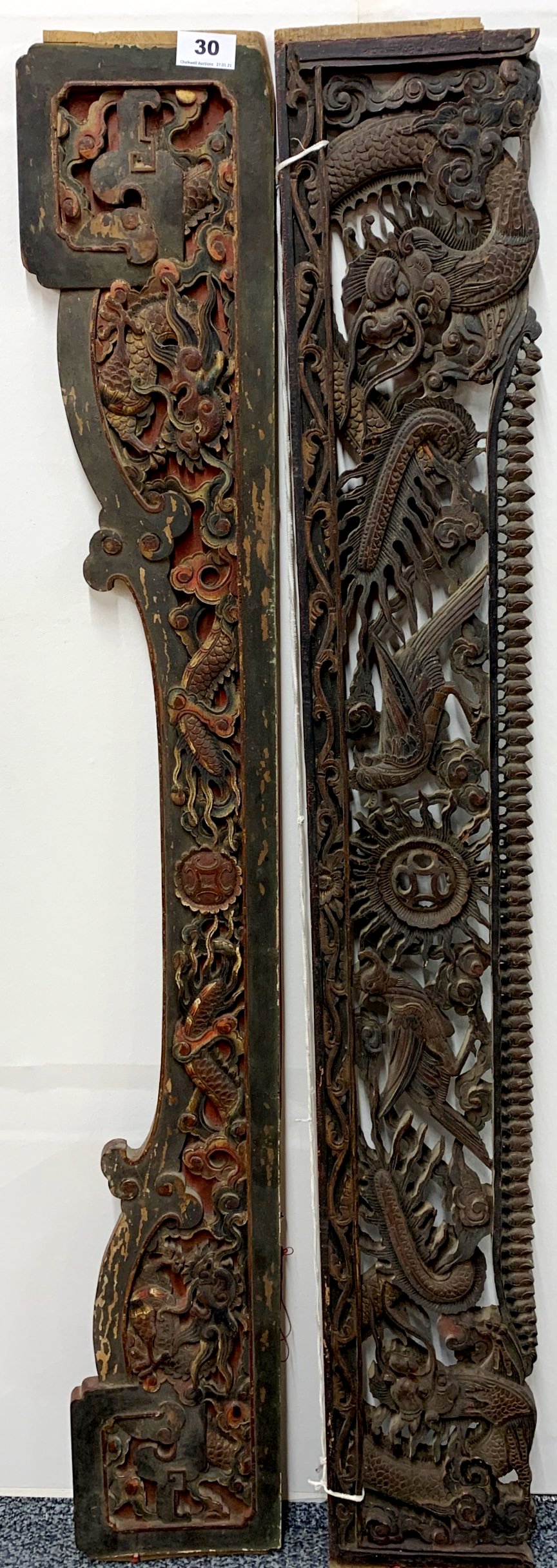 Two 19th century Chinese carved wooden panels, 120cm x 18cm.