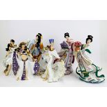 A group of six Danbury Mint porcelain figurines with boxes, H. 26cm.