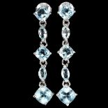 A pair of 925 silver drop earrings set with cushion and marquise cut blue topaz, L. 3.8cm.