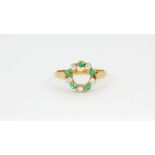 An 18ct yellow gold and platinum emerald and diamond set ring, (Q).