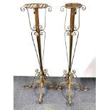 A pair of gold painted wrought iron torchere/ plant stands, H. 122cm.