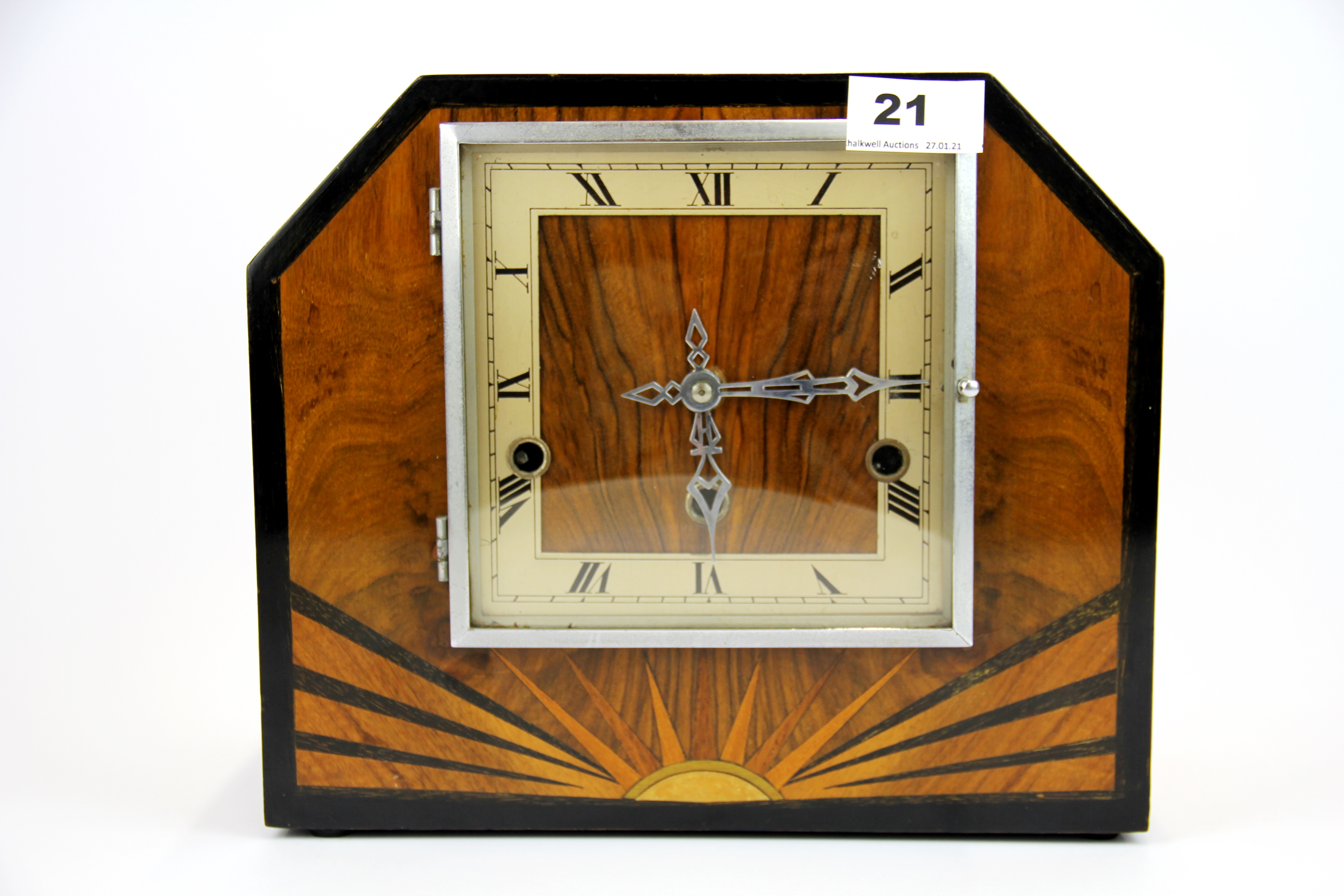 An Art Deco inlaid walnut veneered chiming mantel clock H. 22cm.