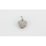 A white metal (tested 18ct gold) diamond pave set heart shaped pendant, L. 1.5cm.