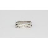 An 18ct white gold diamond set ring, approx. 5.6gr, (N).