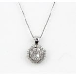A 9ct white gold pendant and chain set with brilliant cut diamonds, approx. 1ct overall, L. 1.7cm.
