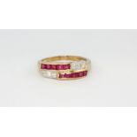 A yellow metal (tested high carat gold) ring set with step cut ruby and brilliant cut diamond, (N).
