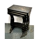 A 19th century nest of four chinoiserie decorated side tables, largest 31cm x 54cm x 70cm.