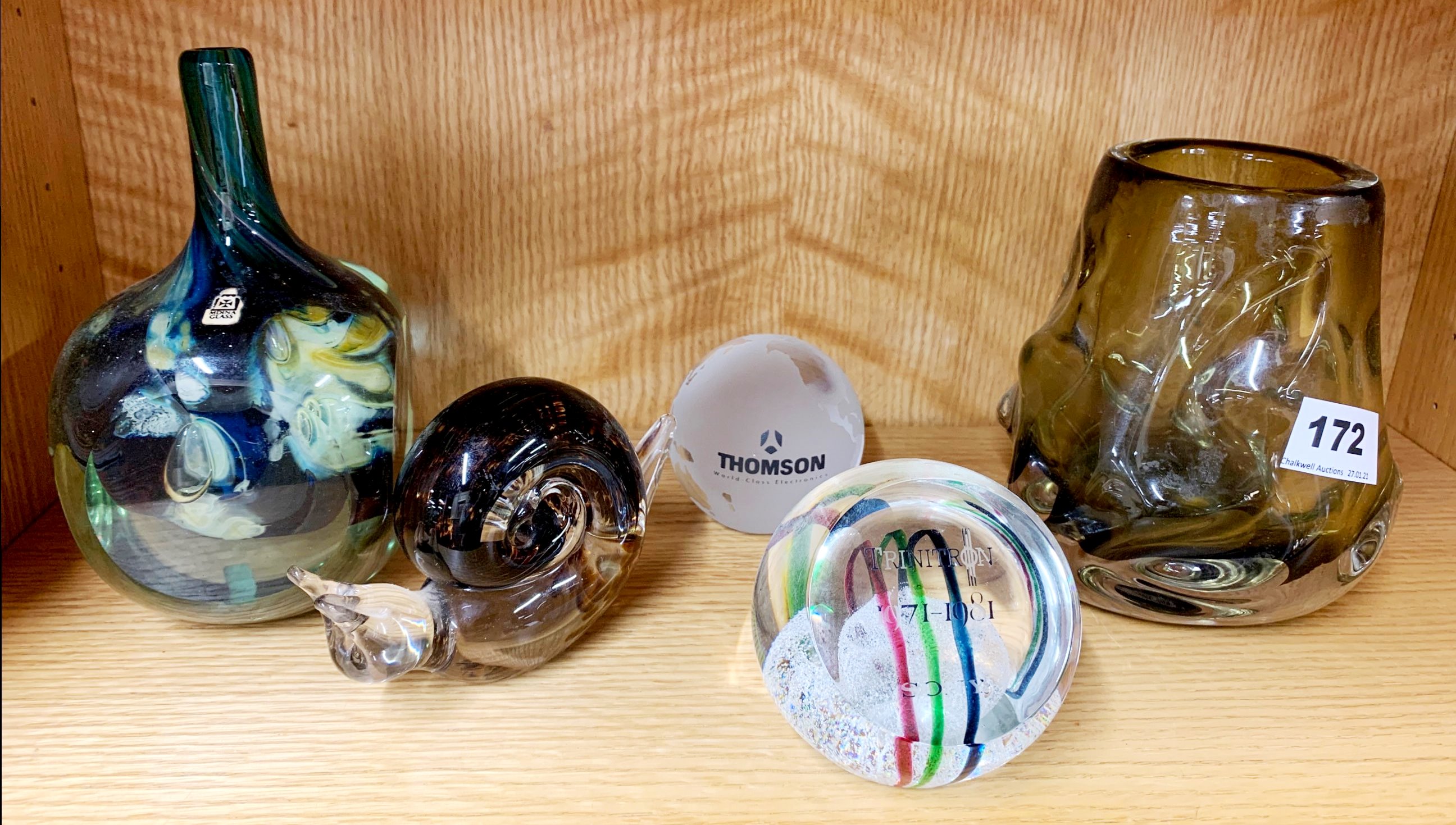 A Whitefriars glass vase together with a Mdina vase and three paper weights.