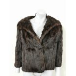 A vintage mink jacket together with a pair of fur cuffs and collar.