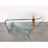 A very unusual 'hinged' plate glass coffee table, W. 62cm, H. 42cm.