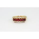 An 18ct yellow gold ruby and diamond set ring,approx. 4.3gr, (M.5).