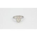 An 18ct white gold ring set with brilliant cut diamonds, approx. 0.50ct, (N.5).