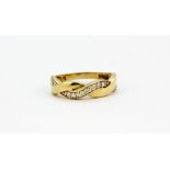A 14ct yellow gold stone set wave ring, approx. 3.3gr, (N.5).