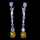 A pair of 925 silver drop earrings set with tanzanite, sapphire and cabochon cut fire opals, L.