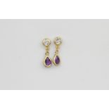 A pair of 9ct yellow gold drop earrings set with white stones and pear cut amethysts, L. 1.6cm.
