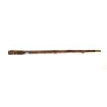 An oriental carved wooden walking stick with detachable handle, L. 97cm.