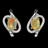 A pair of 925 silver oval cut opal and white stone set earrings, L. 1.8cm.