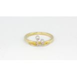 A 14ct yellow and white gold diamond set ring, (O).