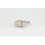 A 900 platinum ring set with brilliant cut diamonds, approx. 1.35ct overall, (N).