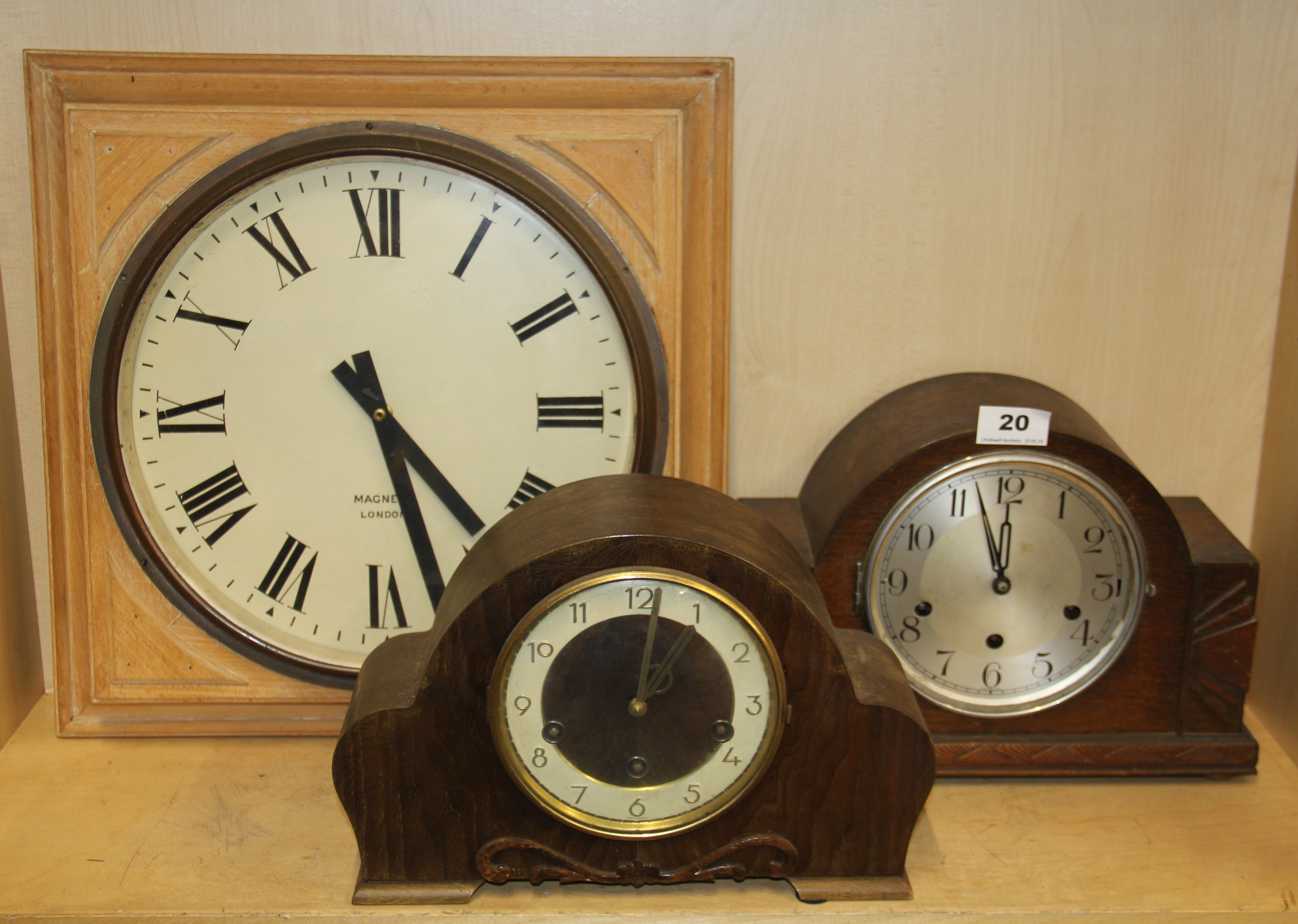 Two mid-20th century mantel clocks and a pine framed wall clock with battery movement.