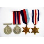 A group of WWII service medals.