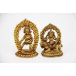 Two small Tibetan gilt bronze figures of Buddhist deities, tallest 9cm.