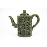 An unusual Chinese green clay Yixing terracotta teapot, H. 18cm.
