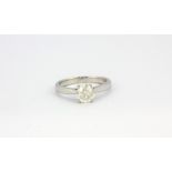 An 18ct white gold solitaire ring set with an approx. 1ct brilliant cut diamond, (M.5).