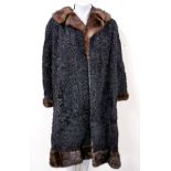 A vintage astrachan and mink coat.