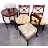 Three mahogany side chairs and an Edwardian mahogany table with an upholstered footstool.