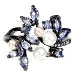 A 925 silver ring set with marquise cut tanzanites and pearls, (Q).