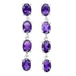 A pair of 925 silver drop earrings set with oval cut amethysts, L. 4cm.