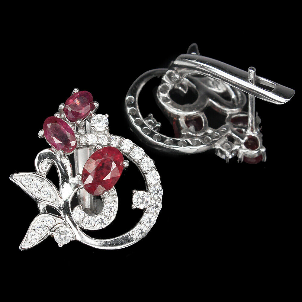 A pair of 925 silver earrings set with rubies and white stones, L. 1.8cm. - Image 2 of 2
