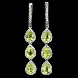 A pair of 925 silver drop earrings set with pear cut peridots and white stones, L. 4.7cm.