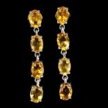 A pair of 925 silver drop earrings set with oval cut citrines, L. 3.6cm.