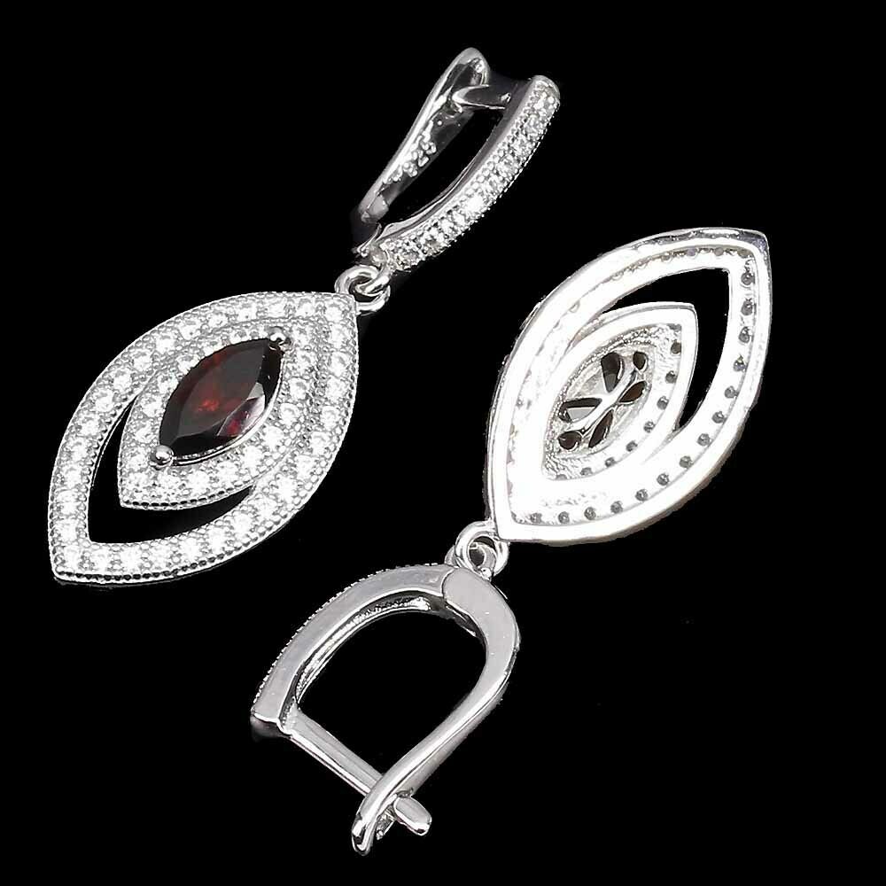 A pair of 925 silver drop earrings set with marquise cut garnet and white stones, L. 3.2cm. - Image 2 of 2